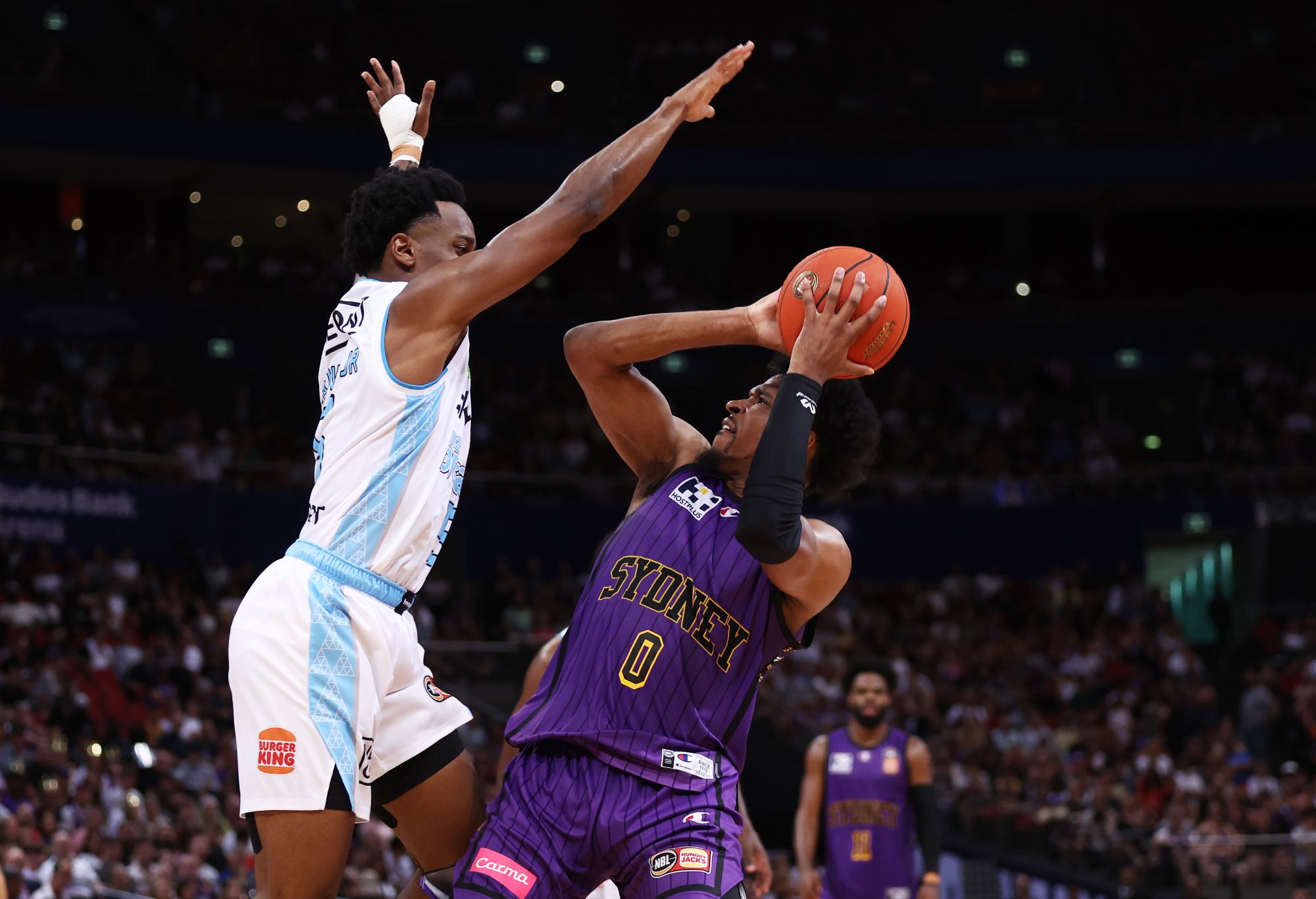 SYDNEY, AUSTRALIA - MARCH 3: Justin Simon of the Kings is tackled by Barry Brown Jr. of the Breakers during game one of the NBL Grand Final Series between Sydney Kings and New Zealand Breakers at Qudos Bank Arena on March 3, 2023 in Sydney challenged , Australia. (Photo by Matt King/Getty Images)