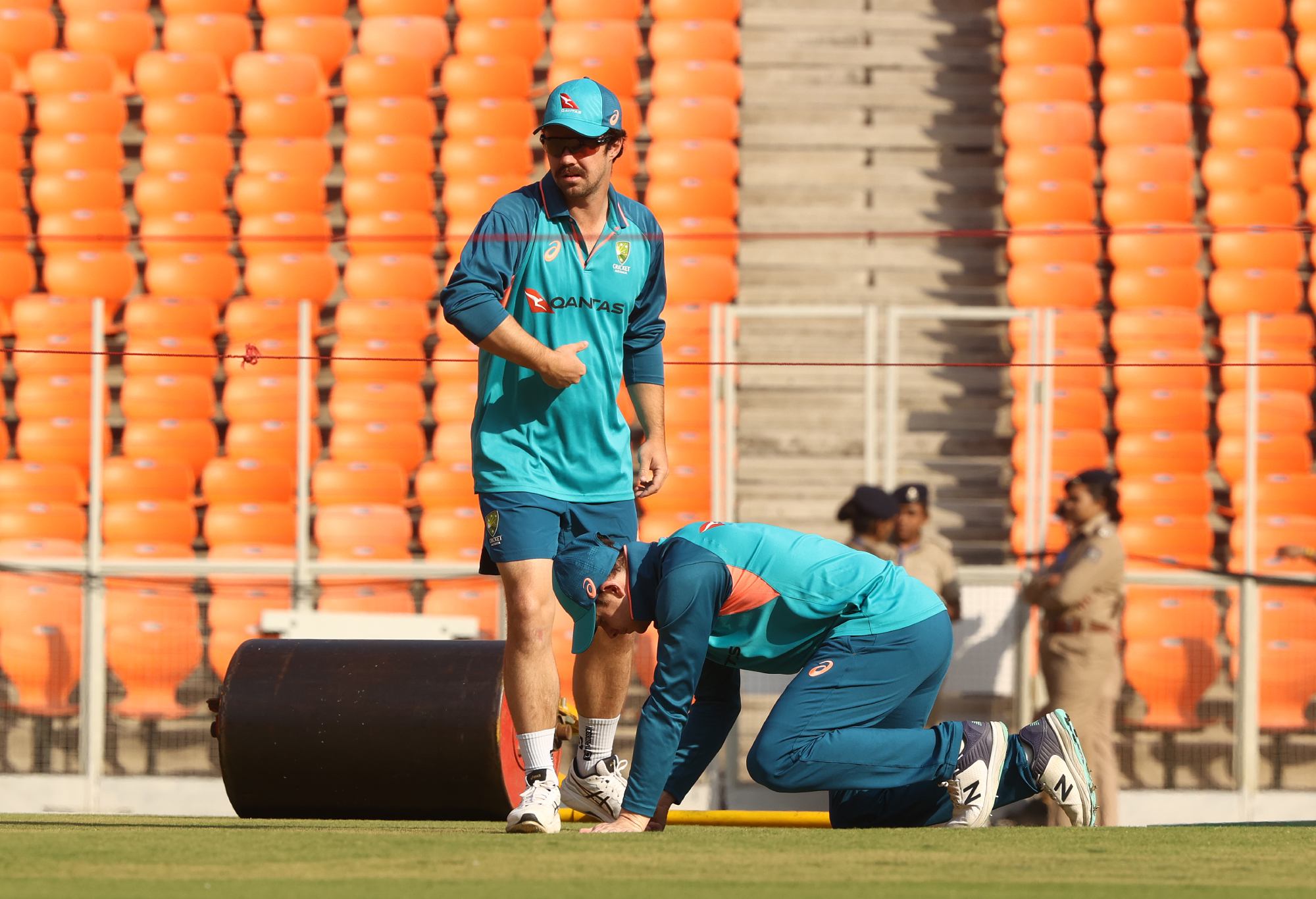 AHMEDABAD, INDIA - MARCH 7: Travis Head and Steve Smith of Australia inspect the pitch during a training session of Australia Test Team at Narendra Modi Stadium on March 7, 2023 in Ahmedabad, India. (Photo by Robert Cianflone/Getty Images)