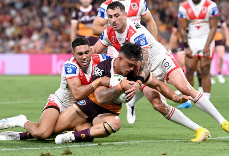 BRISBANE, AUSTRALIA - MARCH 18: Kotoni Staggs of the Broncos scores a try during the round three NRL match between Brisbane Broncos and St George Illawarra Dragons at Suncorp Stadium on March 18, 2023 in Brisbane, Australia. (Photo by Bradley Kanaris/Getty Images)