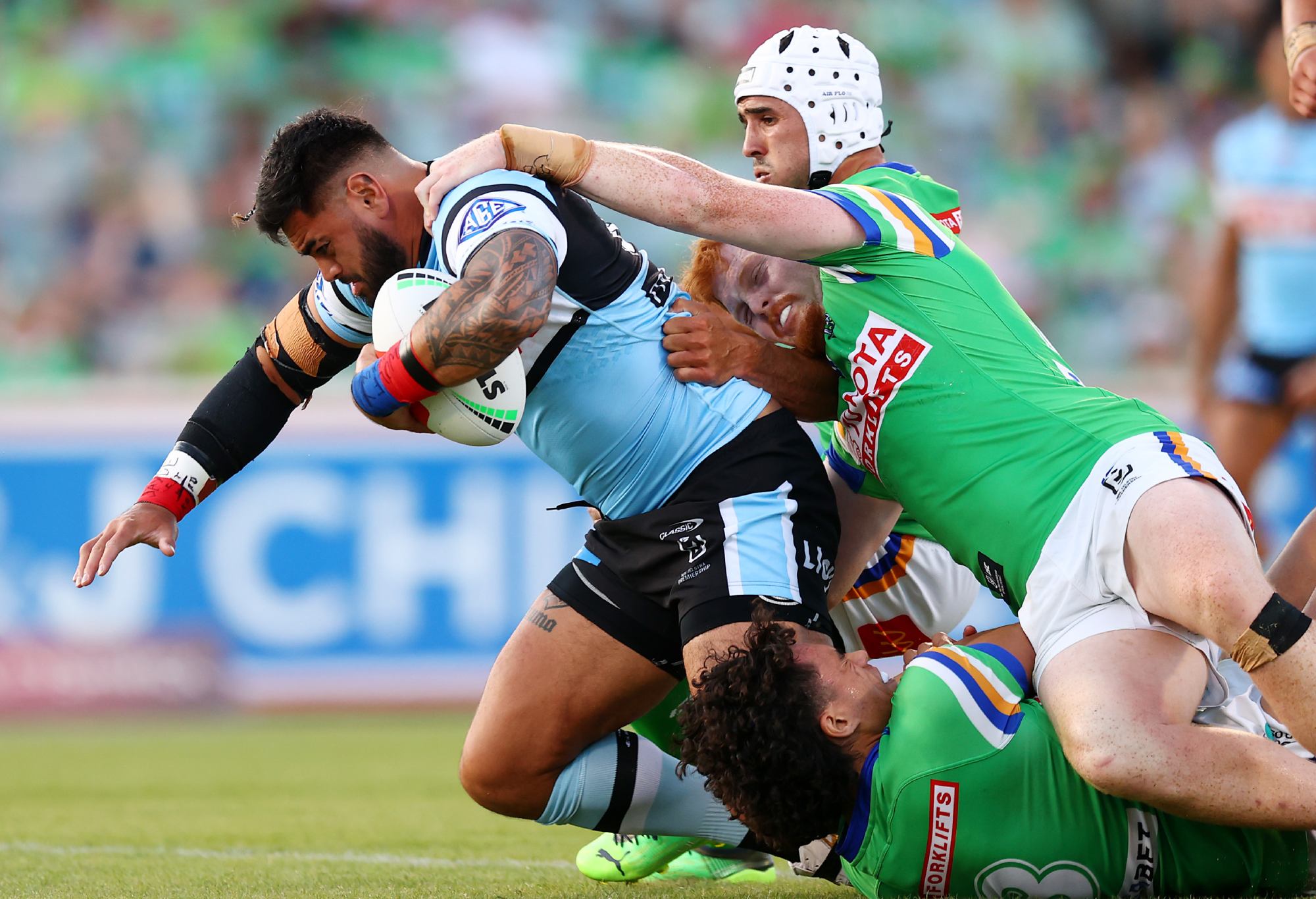 CANBERRA, AUSTRALIA - MARCH 19: Royce Hunt of the Sharks is tackled during the round three NRL match between Canberra Raiders and Cronulla Sharks at GIO Stadium on March 19, 2023 in Canberra, Australia. (Photo by Mark Nolan/Getty Images)