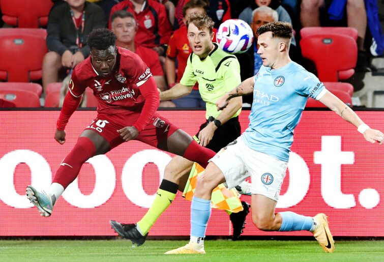 Nestory Irankunda of Adelaide United and Scott Robert Galloway of Melbourne City during the round 19 A-League Men's match between Adelaide United and Melbourne City at Coopers Stadium, on March 03, 2023, in Adelaide, Australia. (Photo by Sarah Reed/Getty Images)