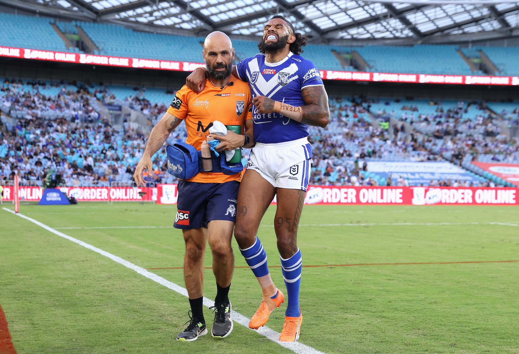 SYDNEY, AUSTRALIA - APRIL 02: Josh Addo-Carr of the Bulldogs injures himself during the round five NRL match between Canterbury Bulldogs and North Queensland Cowboys at Accor Stadium on April 02, 2023 in Sydney, Australia. (Photo by Cameron Spencer/Getty Images)