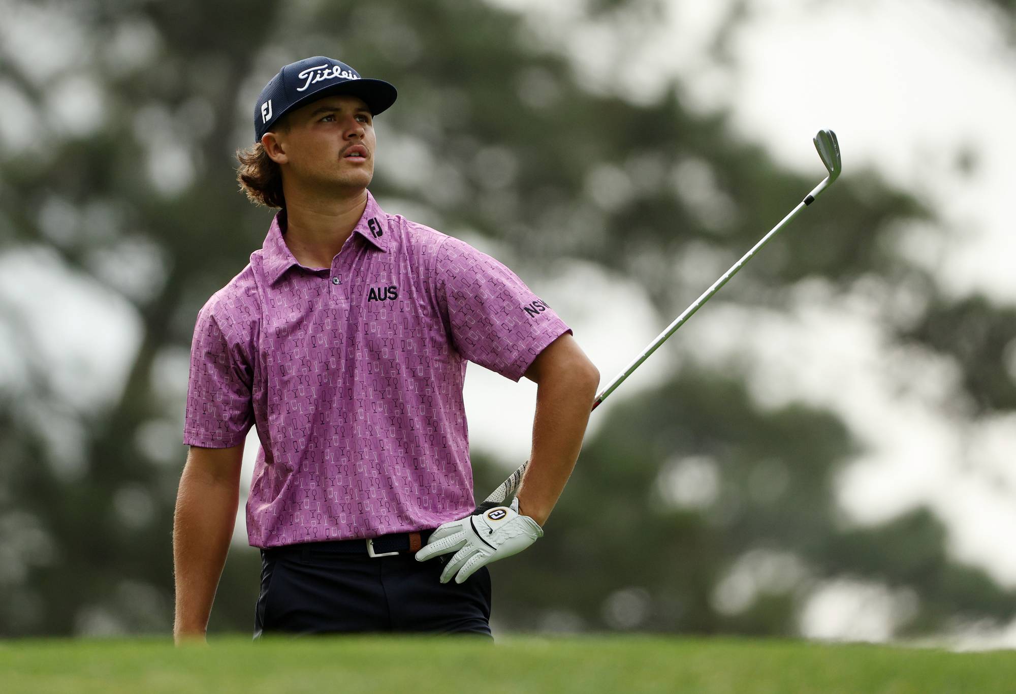Amateur Harrison Crowe of Australia reacts after playing his shot from the fourth tee during the first round of the 2023 Masters Tournament at Augusta National Golf Club on April 06, 2023 in Augusta, Georgia. (Photo by Patrick Smith/Getty Images)