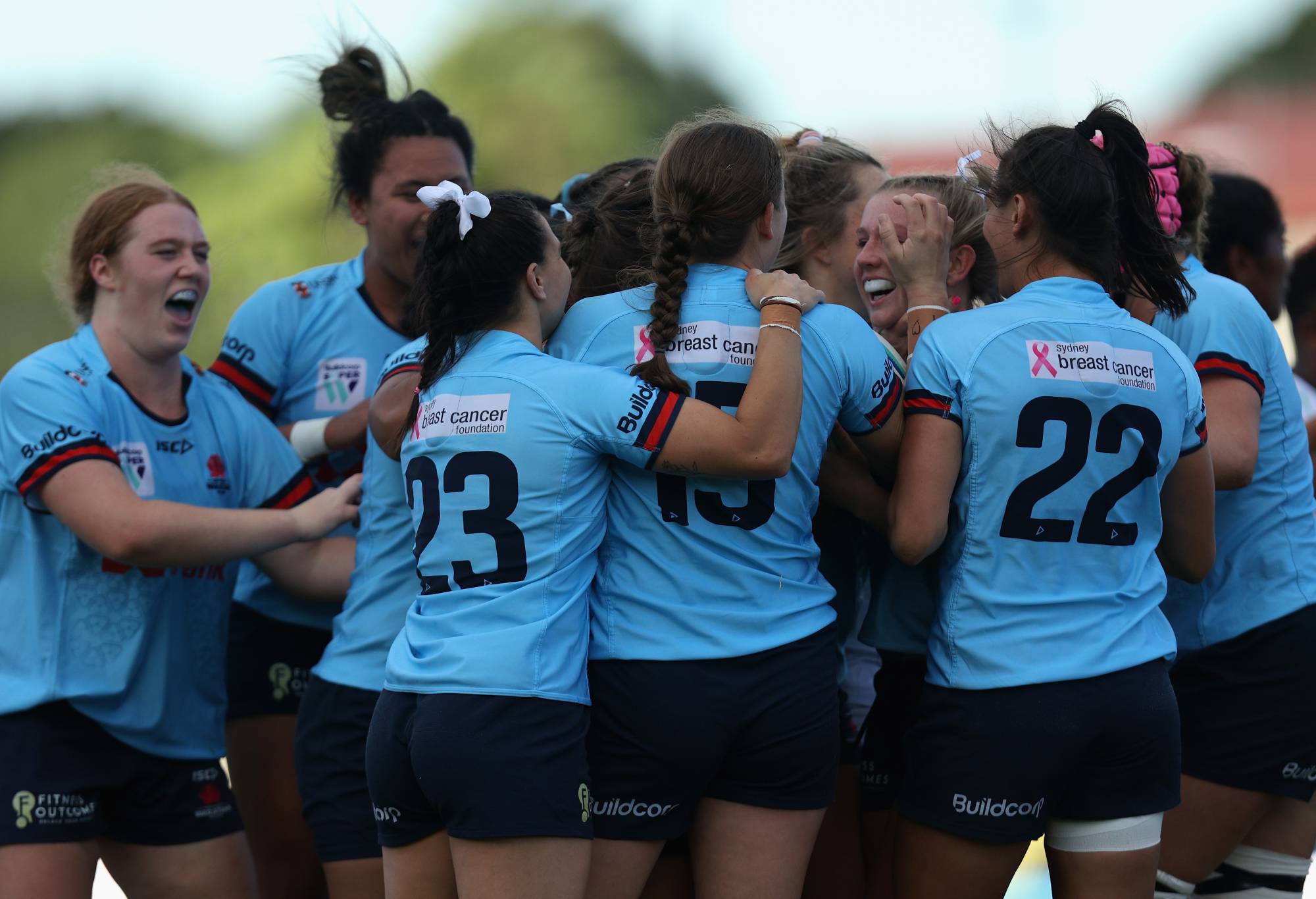 The NSW Waratahs celebrate after scoring a try during the Super W match between NSW Waratahs Women and Fijian Drua at Concord Oval, on April 08, 2023, in Sydney, Australia. (Photo by Tim Allsop/Getty Images)