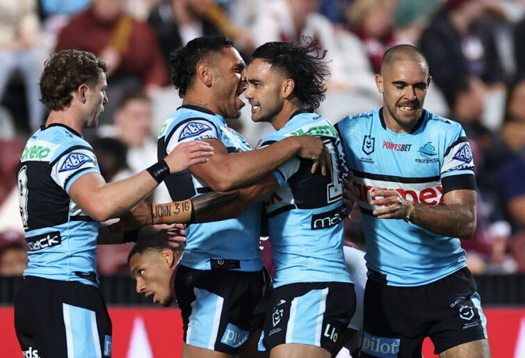 SYDNEY, AUSTRALIA - MAY 14: Jesse Ramien of the Sharks celebrates scoring a try with team mates during the round 11 NRL match between Manly Sea Eagles and Cronulla Sharks at 4 Pines Park on May 14, 2023 in Sydney, Australia. (Photo by Cameron Spencer/Getty Images)