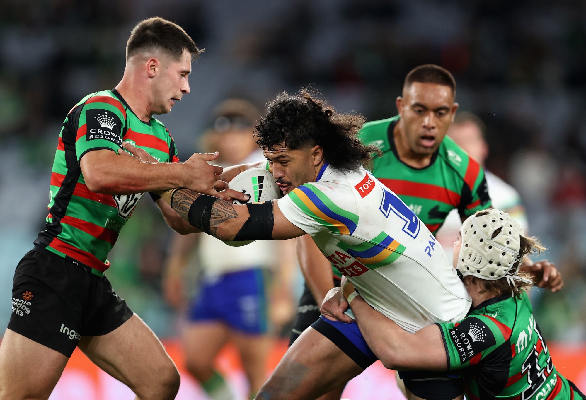 SYDNEY, AUSTRALIA - MAY 27: Corey Harawira-Naera of the Raiders is tackled during the round 13 NRL match between South Sydney Rabbitohs and Canberra Raiders at Accor Stadium on May 27, 2023 in Sydney, Australia. (Photo by Brendon Thorne/Getty Images)
