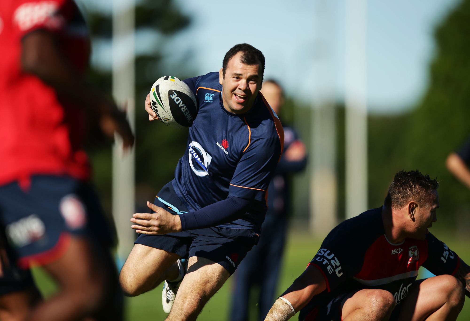 SYDNEY, AUSTRALIA - JUNE 17: Waratahs coach Michael Cheika takes part in a drill during a joint training session between the Waratahs and the Sydney Roosters at Kippax Lake on June 17, 2014 in Sydney, Australia. (Photo by Matt King/Getty Images)