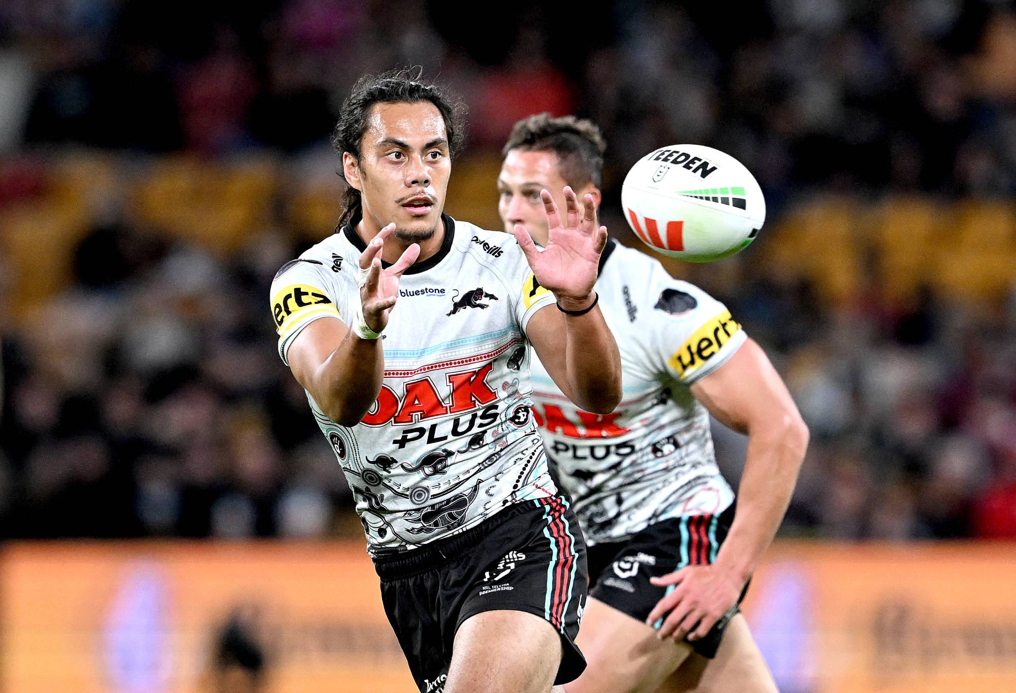 Jarome Luai of the Panthers catches the ball during the round 12 NRL match between Brisbane Broncos and Penrith Panthers at Suncorp Stadium on May 18, 2023 in Brisbane, Australia. (Photo by Bradley Kanaris/Getty Images)
