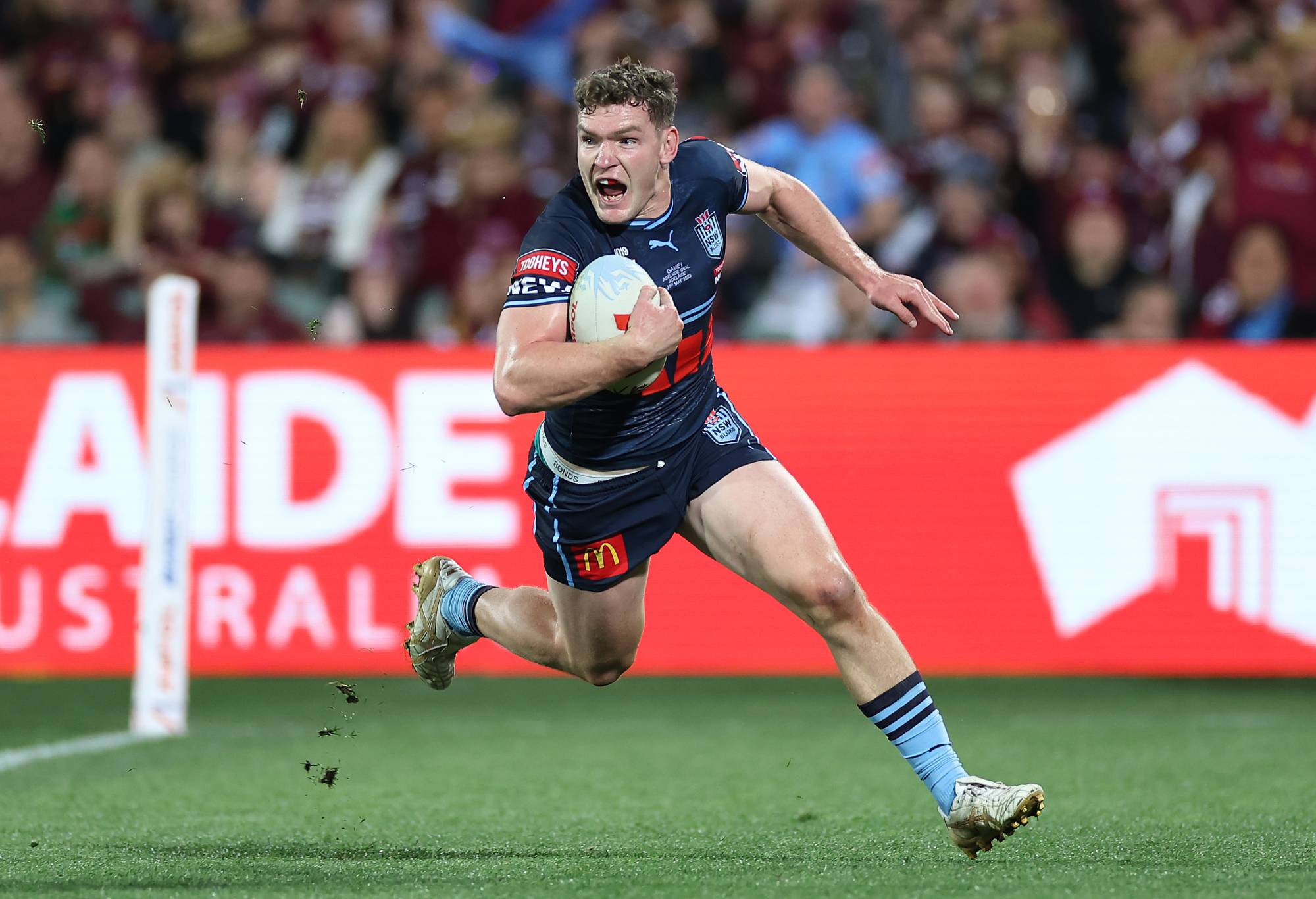Liam Martin of the Blues scores a try during game one of the 2023 State of Origin series between the Queensland Maroons and New South Wales Blues at Adelaide Oval on May 31, 2023 in Adelaide, Australia. (Photo by Cameron Spencer/Getty Images)