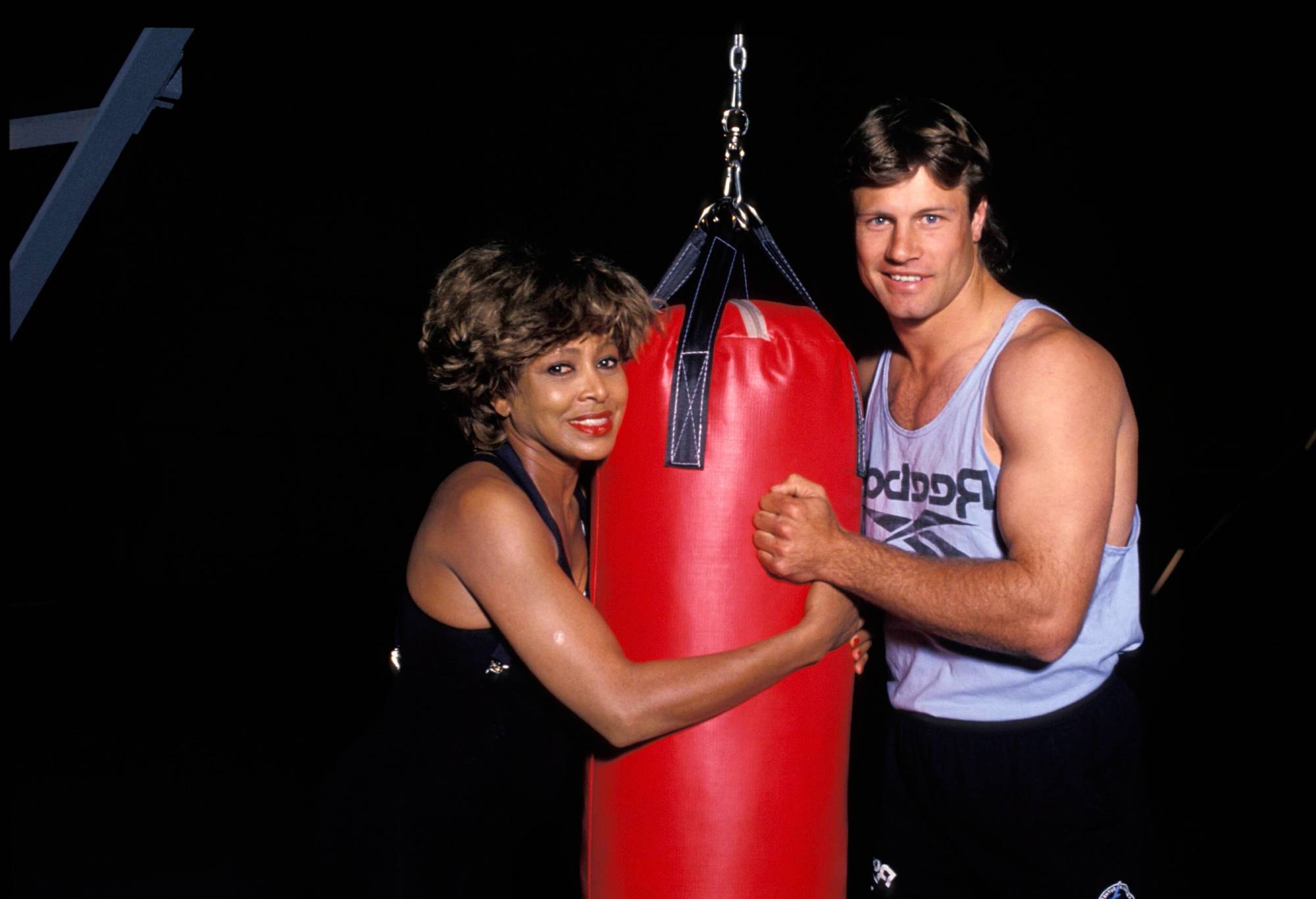 TINA TURNER AND RUGBY LEAGUE PERSONALITY ANDREW ETTINGHAUSEN IN SYDNEY.(Photo by Patrick Riviere/Getty Images)