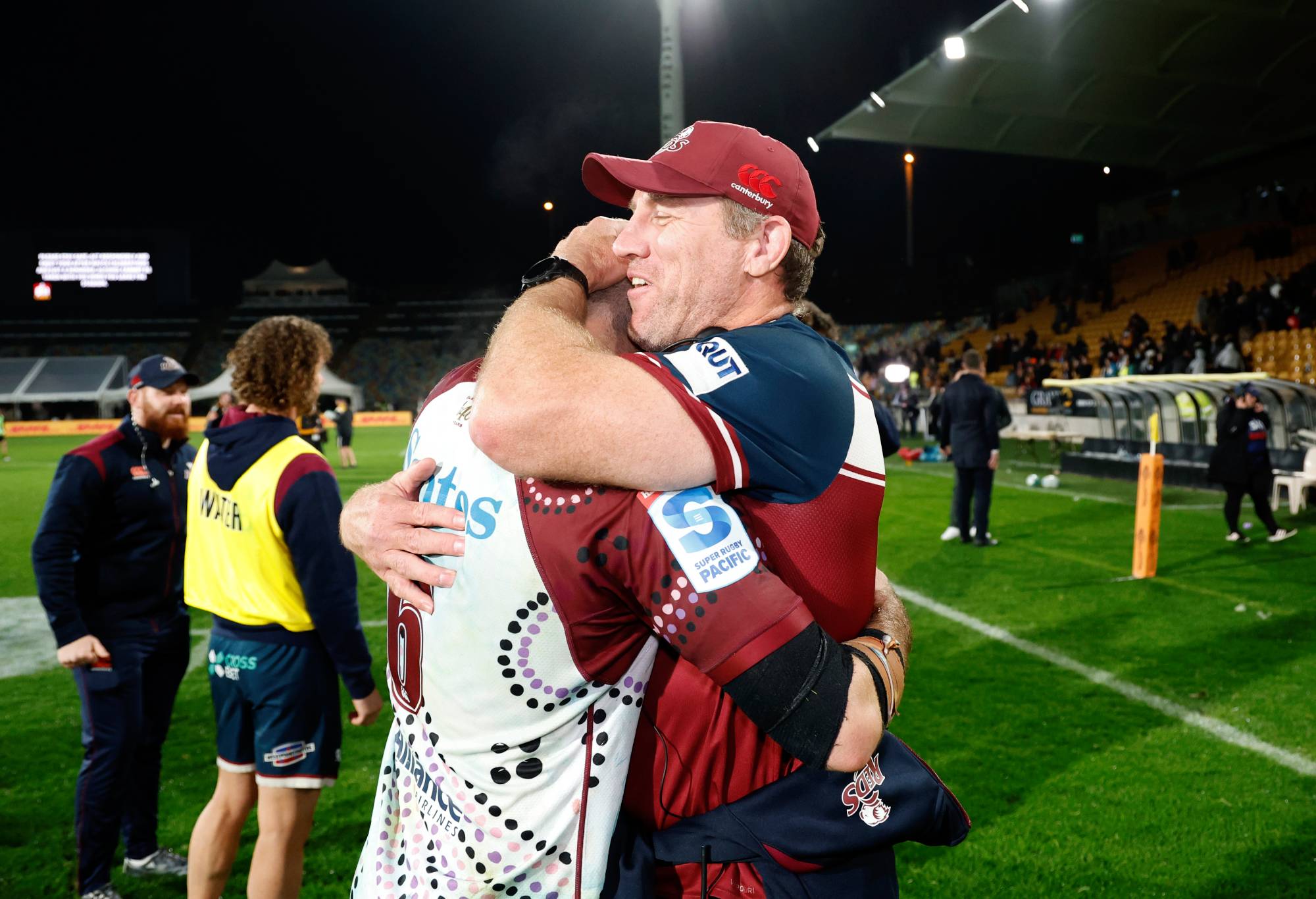 The Reds' Liam Wright celebrates with head coach Brad Thorn during the Super Rugby Pacific Round 12 game between the Chiefs and Queensland Reds at Yarrow Stadium on May 12, 2023 in New Plymouth, New Zealand. (Photo by Andy Jackson/Getty Images)