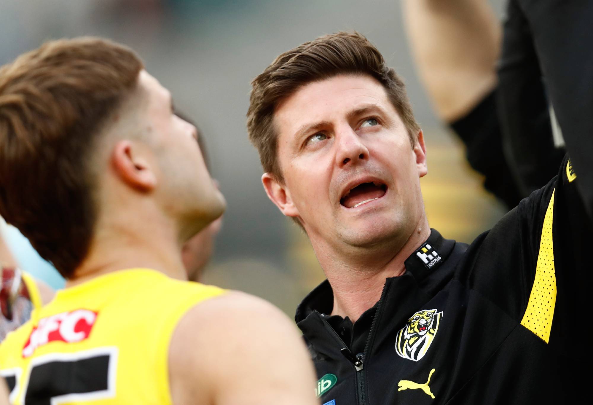Richmond interim coach, Andrew McQualter speaks to his players during the round 11 AFL match between Richmond Tigers and Yartapuulti / Port Adelaide Power at Melbourne Cricket Ground, on May 28, 2023, in Melbourne, Australia. (Photo by Darrian Traynor/AFL Photos/via Getty Images)