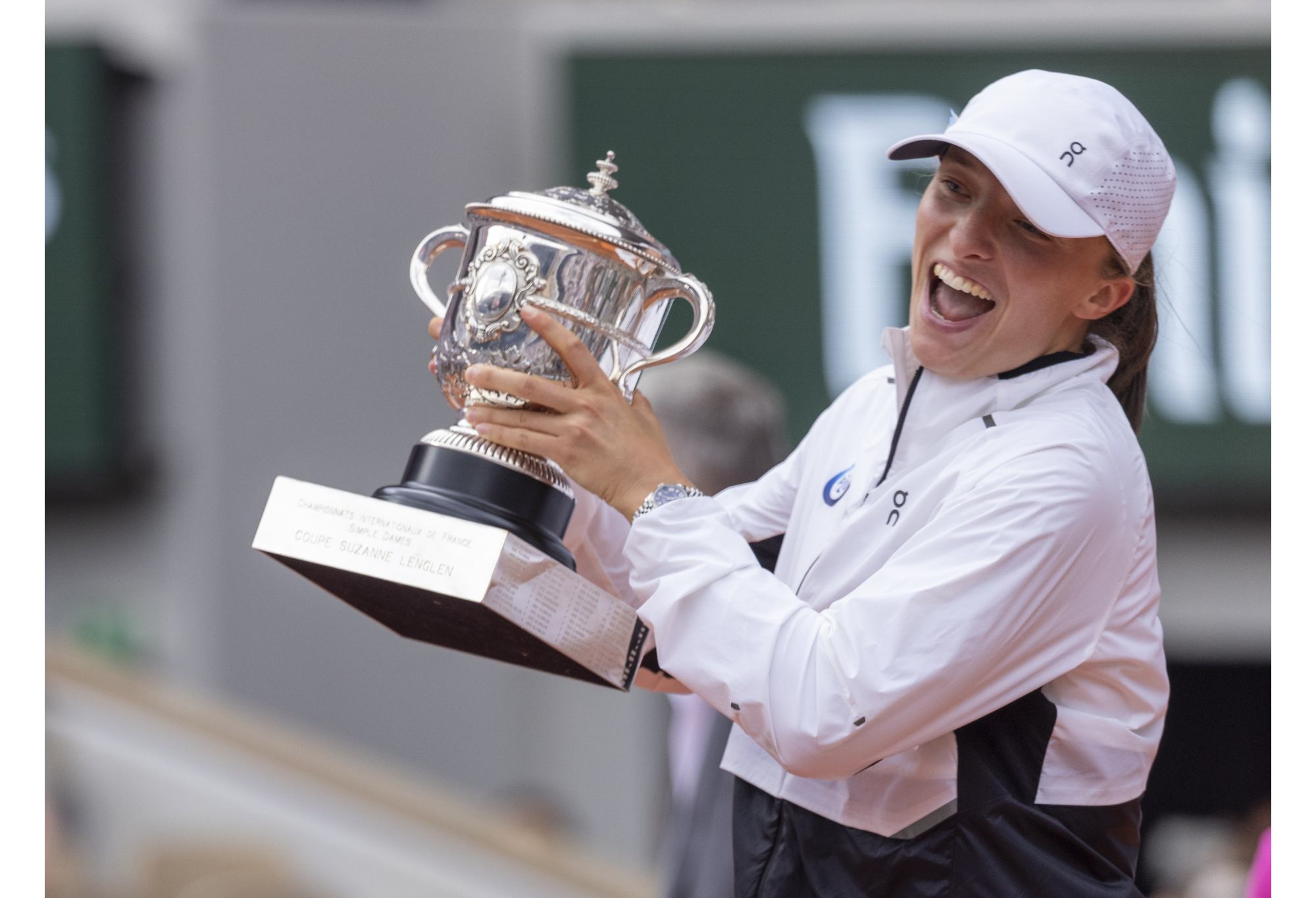 PARIS, FRANCE - JUNE 10: Iga Swiatek of Poland celebrates with her winners trophy after victory against Karolina Muchova of Czech Republic in the Women's Singles Final match on Day Fourteen of the 2023 French Open at Roland Garros on June 10, 2023 in Paris, France. (Photo by Tnani Badreddine/DeFodi Images via Getty Images)