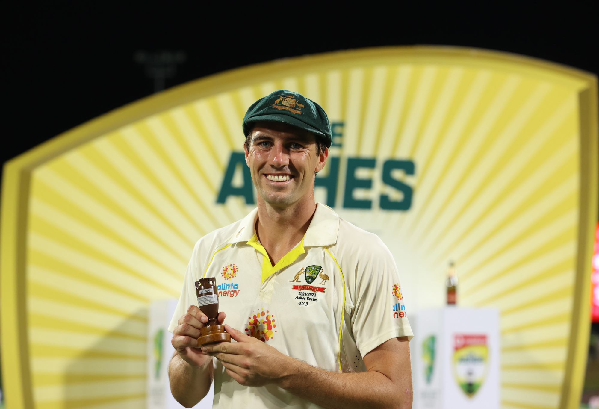 HOBART, AUSTRALIA - JANUARY 16: Pat Cummins of Australia celebrates with the Ashes after winning the Fifth Test in the Ashes series between Australia and England at Blundstone Arena on January 16, 2022 in Hobart, Australia. (Photo by Robert Cianflone/Getty Images)