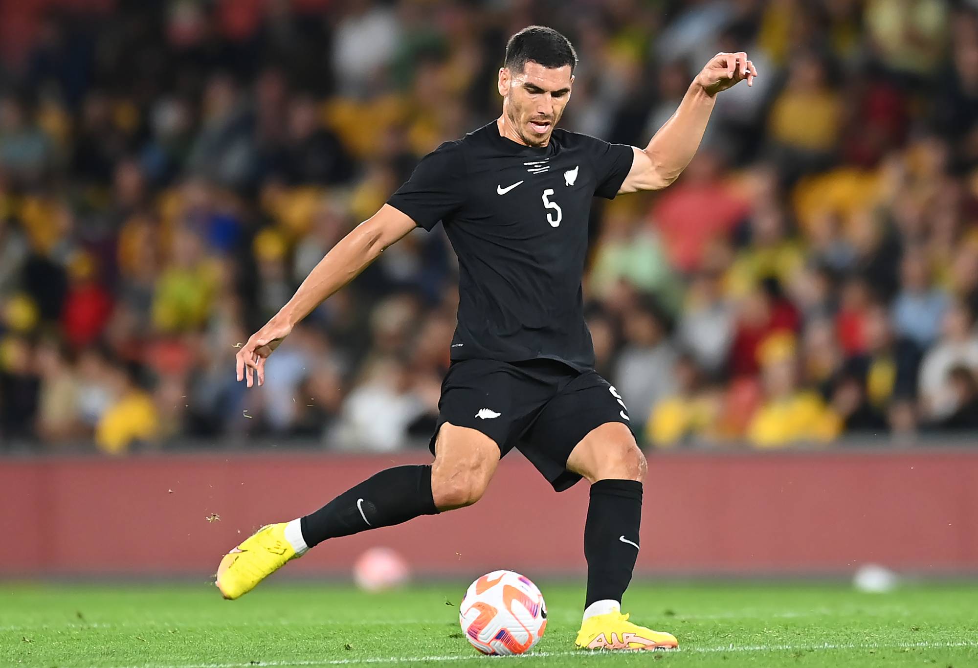 BRISBANE, AUSTRALIA - SEPTEMBER 22: Michael Boxall of New Zealand in action during the International Friendly match between the Australia Socceroos and the New Zealand All Whites at Suncorp Stadium on September 22, 2022 in Brisbane, Australia. (Photo by Albert Perez/Getty Images)