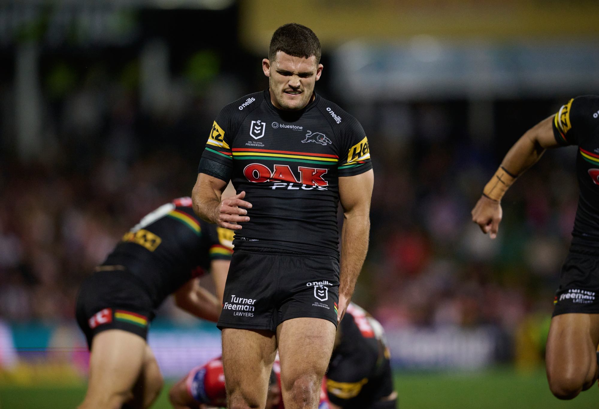 PENRITH, AUSTRALIA - JUNE 04: Nathan Cleary of the Panthers clutches his leg with an injury during the round 14 NRL match between Penrith Panthers and St George Illawarra Dragons at BlueBet Stadium on June 04, 2023 in Penrith, Australia. (Photo by Brett Hemmings/Getty Images)