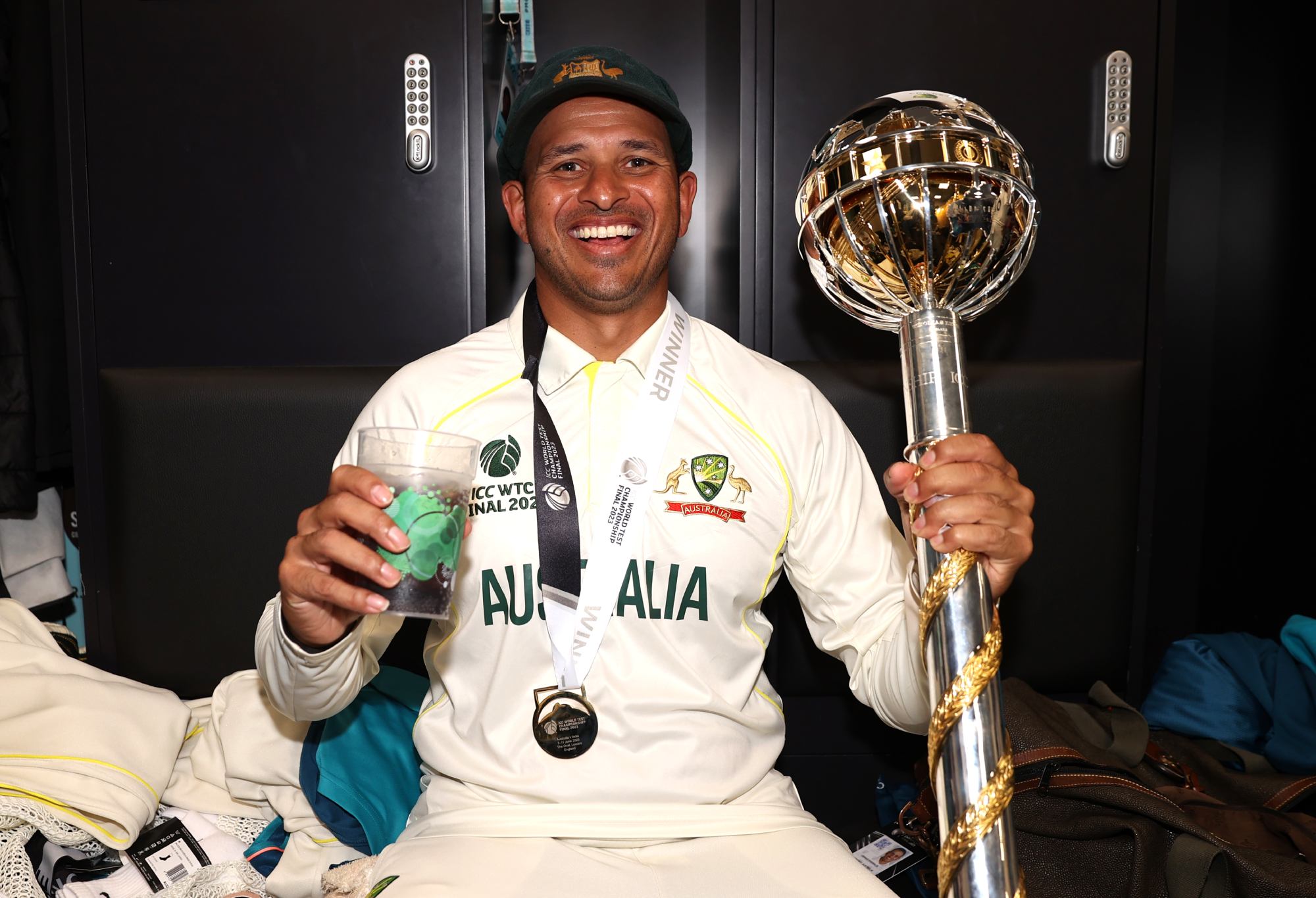 LONDON, ENGLAND - JUNE 11: Usman Khawaja of Australia poses for a photo with the ICC World Test Championship Mace in the changing room on day five of the ICC World Test Championship Final between Australia and India at The Oval on June 11, 2023 in London, England. (Photo by Ryan Pierse-ICC/ICC via Getty Images)