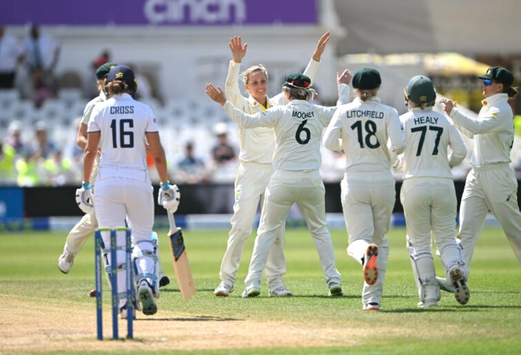 NOTTINGHAM, ENGLAND - JUNE 26: Australia bowler Ashleigh Gardner is congratulated by team mates after taking the wicket of Kate Cross during day five of the LV= Insurance Women's Ashes Test match between England and Australia at Trent Bridge on June 26, 2023 in Nottingham, England. (Photo by Stu Forster/Getty Images)