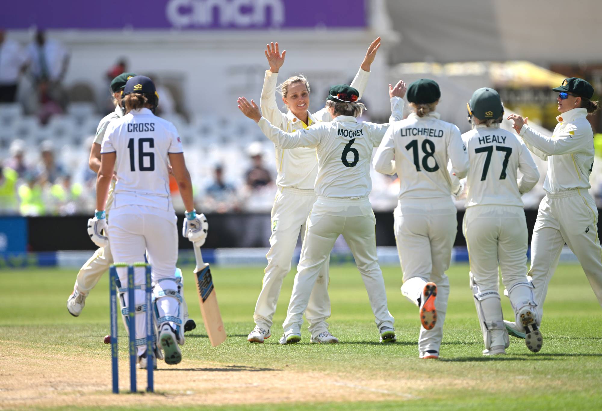 NOTTINGHAM, ENGLAND - JUNE 26: Australia bowler Ashleigh Gardner is congratulated by team mates after taking the wicket of Kate Cross during day five of the LV= Insurance Women's Ashes Test match between England and Australia at Trent Bridge on June 26, 2023 in Nottingham, England. (Photo by Stu Forster/Getty Images)