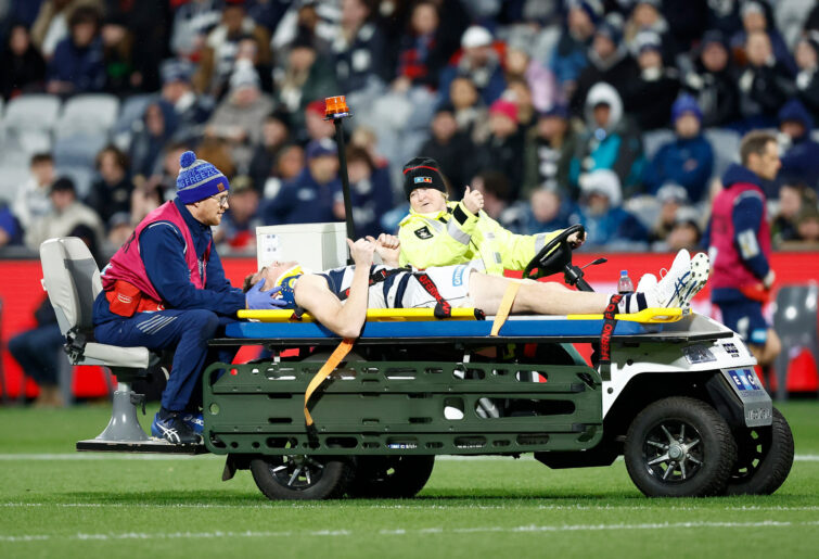 Jeremy Cameron leaves the field on a stretcher.