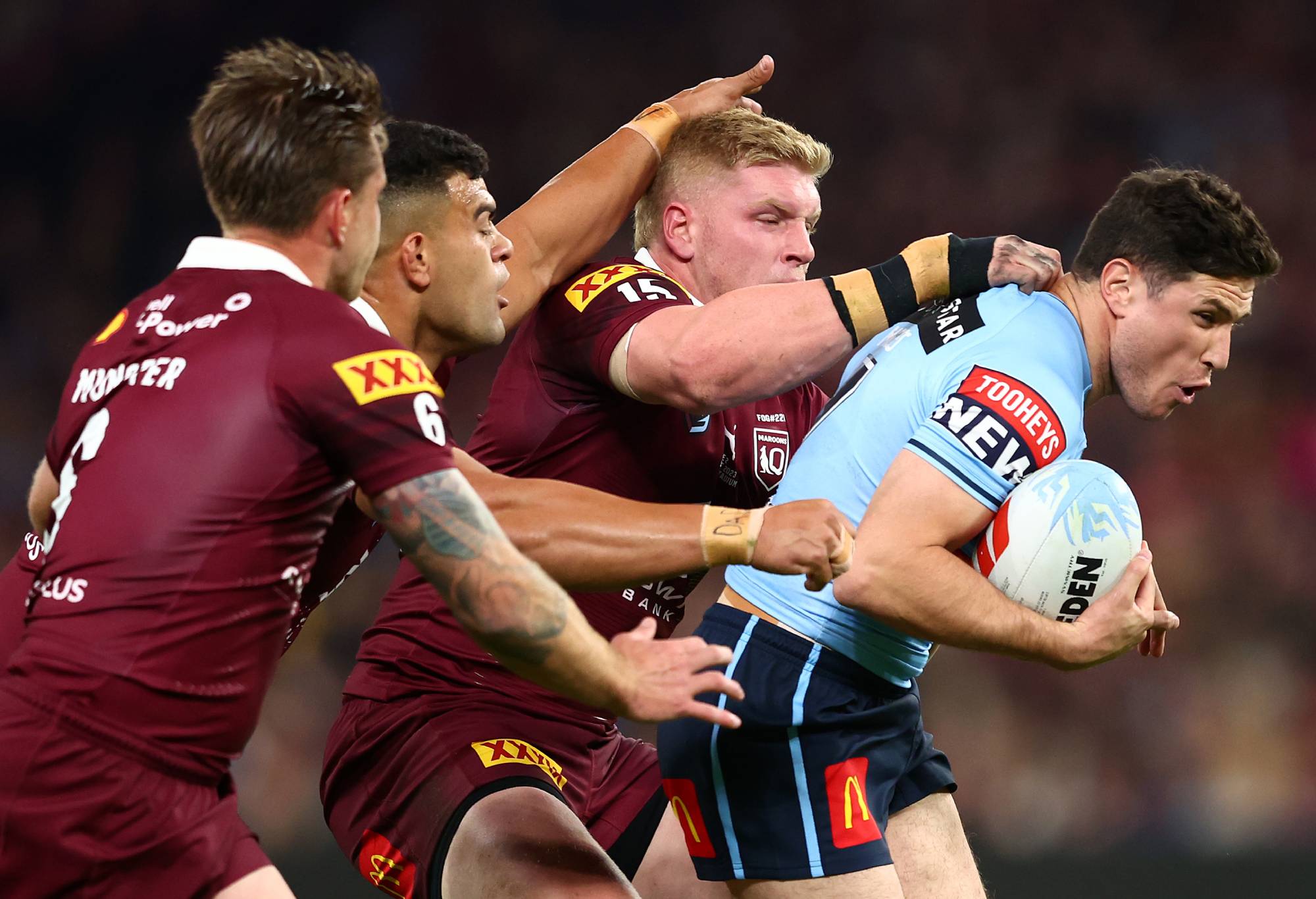 Mitchell Moses of the Blues is tackled during game two of the State of Origin series between the Queensland Maroons and the New South Wales Blues at Suncorp Stadium on June 21, 2023 in Brisbane, Australia. (Photo by Chris Hyde/Getty Images)