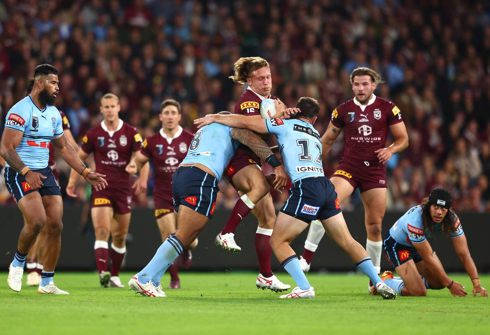 Reuben Cotter of the Maroonsis tackled during game two of the State of Origin series between the Queensland Maroons and the New South Wales Blues at Suncorp Stadium on June 21, 2023 in Brisbane, Australia. (Photo by Chris Hyde/Getty Images)