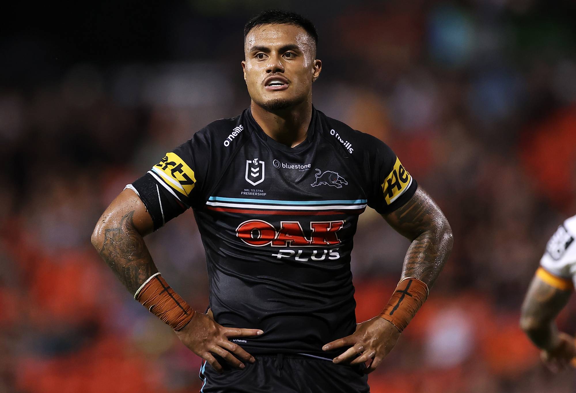Spencer Leniu of the Panthers watches on during the round NRL match between the Penrith Panthers and the Brisbane Broncos at BlueBet Stadium on March 03, 2023 in Penrith, Australia. (Photo by Mark Kolbe/Getty Images)