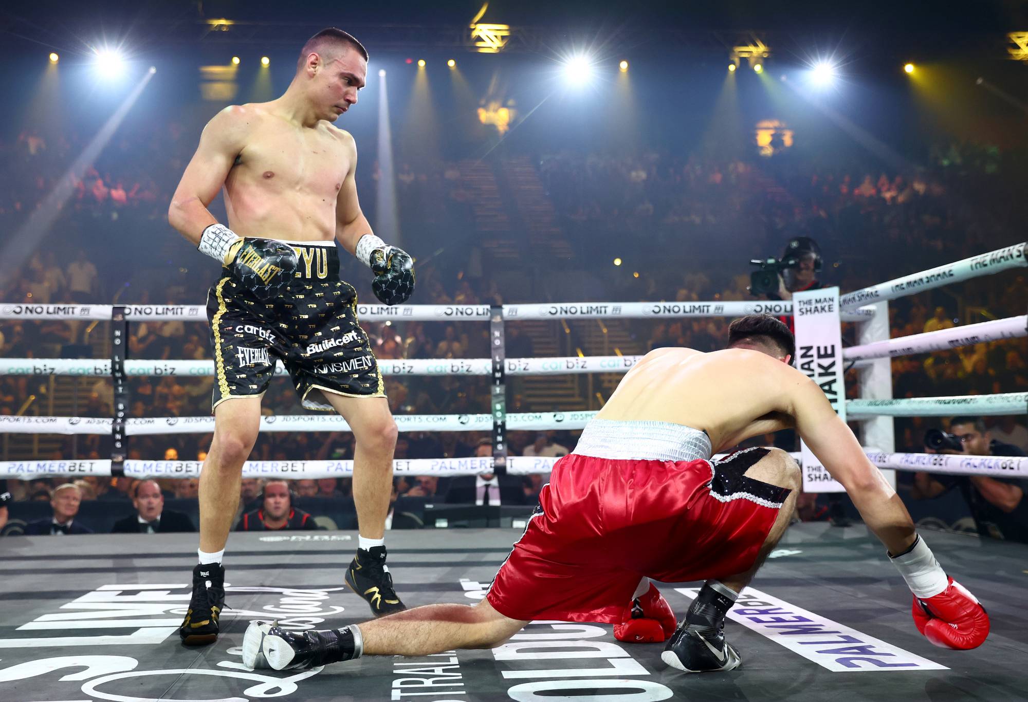 Carlos Ocampo falls to the ground after being punched by Tim Tszyu (left) during the WBO Iterim Super-Welterwight title bout at Gold Coast Convention and Entertainment Centre on June 18, 2023 in Gold Coast, Australia. (Photo by Chris Hyde/Getty Images)