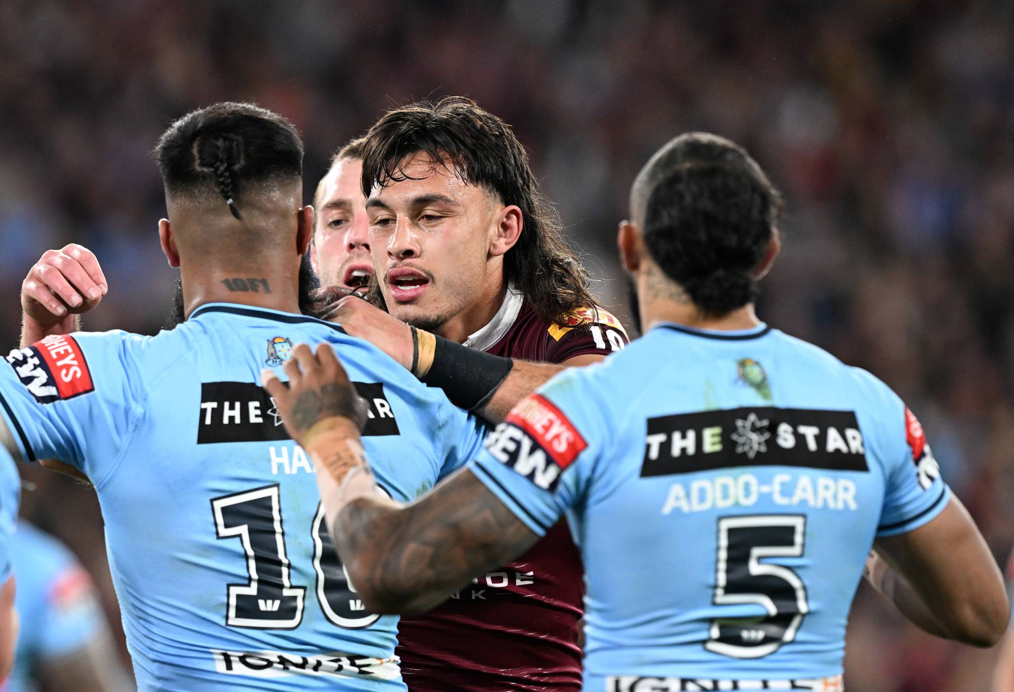 Tino Fa’asuamaleaui of the Maroons scuffles with Payne Haas of the Blues during game two of the State of Origin series between the Queensland Maroons and the New South Wales Blues at Suncorp Stadium on June 21, 2023 in Brisbane, Australia. (Photo by Bradley Kanaris/Getty Images)