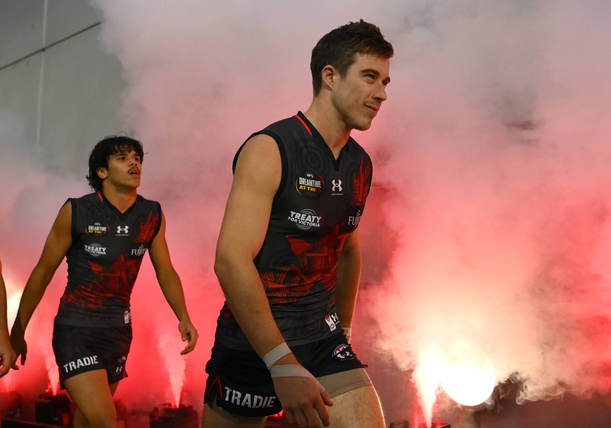 Zach Merrett of the Bombers leads his team out onto the field during the round 10 AFL match between Essendon Bombers and Richmond Tigers at Melbourne Cricket Ground, on May 20, 2023, in Melbourne, Australia. (Photo by Quinn Rooney/Getty Images)
