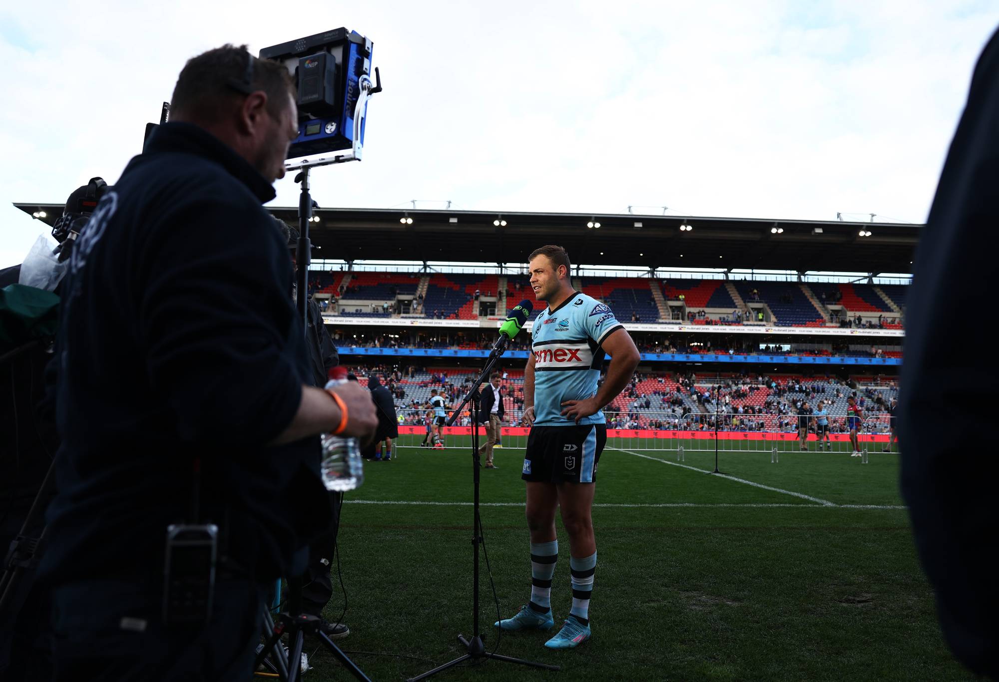 NEWCASTLE, AUSTRALIA - SEPTEMBER 04: Wade Graham of the Sharks is interviewed after the round 25 NRL match between the Newcastle Knights and the Cronulla Sharks at McDonald Jones Stadium, on September 04, 2022, in Newcastle, Australia. (Photo by Mark Metcalfe/Getty Images)
