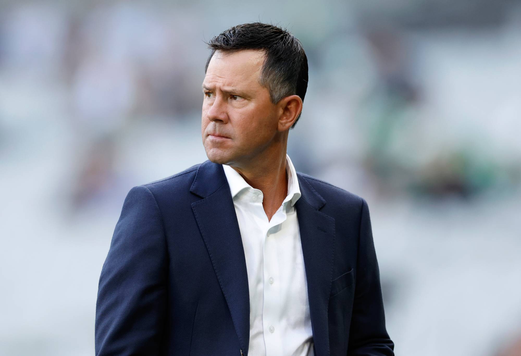 MELBOURNE, AUSTRALIA - JANUARY 25: Cricket commentator and former Australian Cricket captain Ricky Ponting walks across the M.C.G. before the Men's Big Bash League match between the Melbourne Stars and the Sydney Thunder at Melbourne Cricket Ground, on January 25, 2023, in Melbourne, Australia. (Photo by Darrian Traynor/Getty Images)