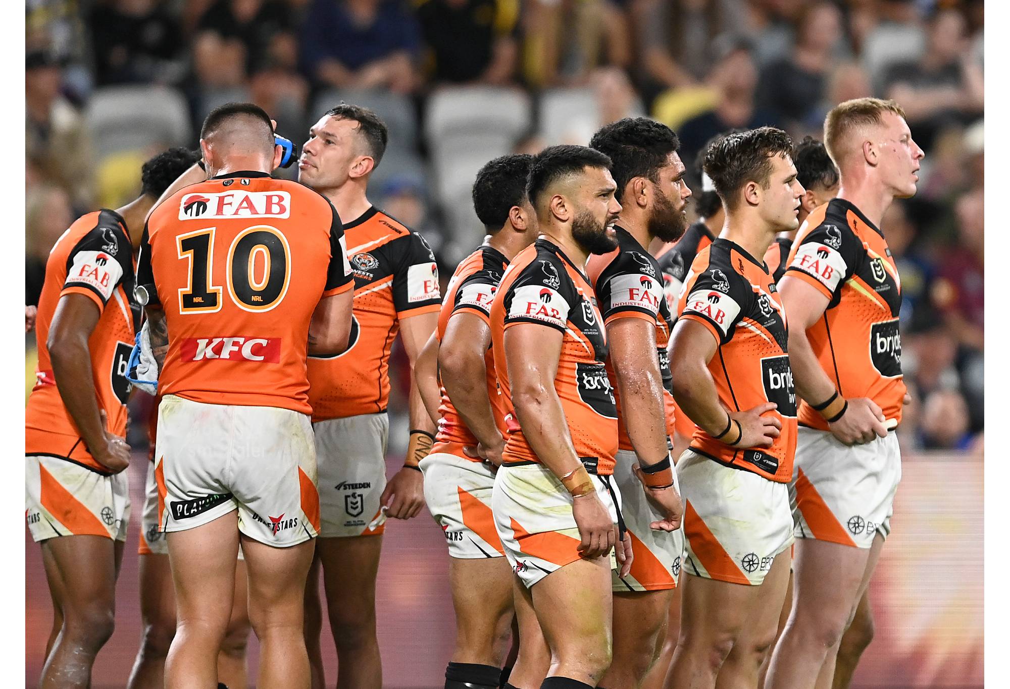 TOWNSVILLE, AUSTRALIA - JULY 01: The Tigers look on waiting for a conversion attempt during the round 18 NRL match between North Queensland Cowboys and Wests Tigers at Qld Country Bank Stadium on July 01, 2023 in Townsville, Australia. (Photo by Ian Hitchcock/Getty Images)