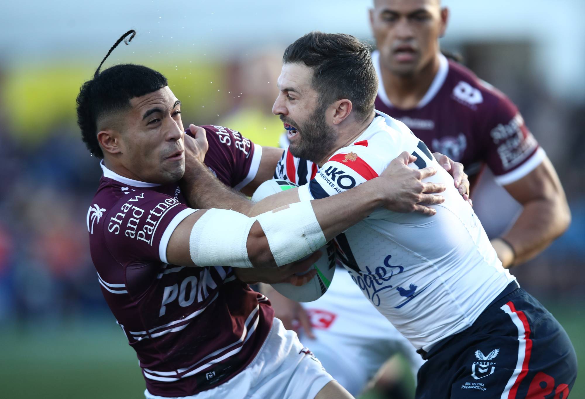 SYDNEY, AUSTRALIA - JULY 02: James Tedesco of the Roosters is tackled during the round 18 NRL match between Manly Sea Eagles and Sydney Roosters at 4 Pines Park on July 02, 2023 in Sydney, Australia. (Photo by Jason McCawley/Getty Images)