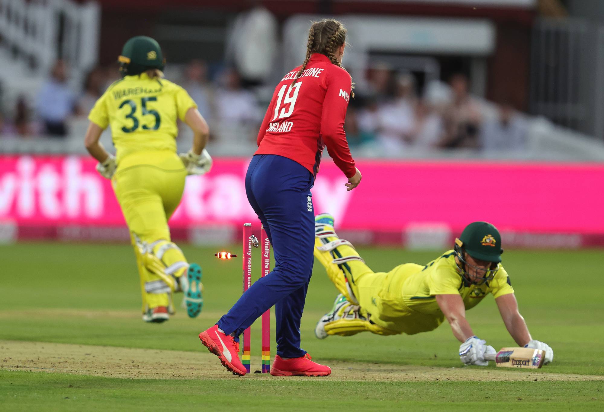 LONDON, ENGLAND - JULY 08: Sophie Ecclestone of England runs out Grace Harris during the Women's Ashes 3rd Vitality IT20 match between England and Australia at Lord's Cricket Ground on July 08, 2023 in London, England. (Photo by David Rogers/Getty Images)