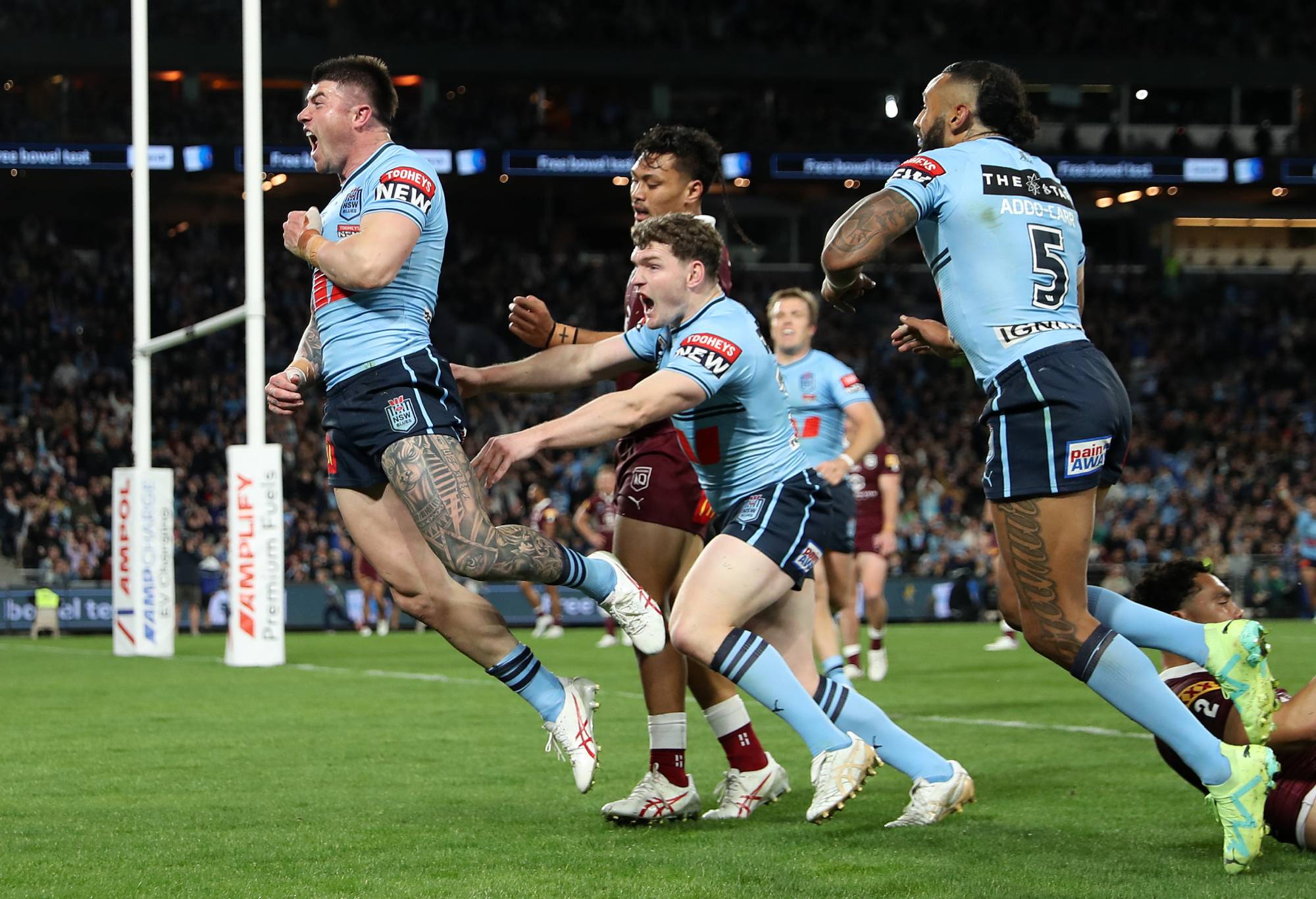 SYDNEY, AUSTRALIA - JULY 12: Bradman Best of the Blues celebrates scoring a try during game three of the State of Origin series between New South Wales Blues and Queensland Maroons at Accor Stadium on July 12, 2023 in Sydney, Australia. (Photo by Brendon Thorne/Getty Images)