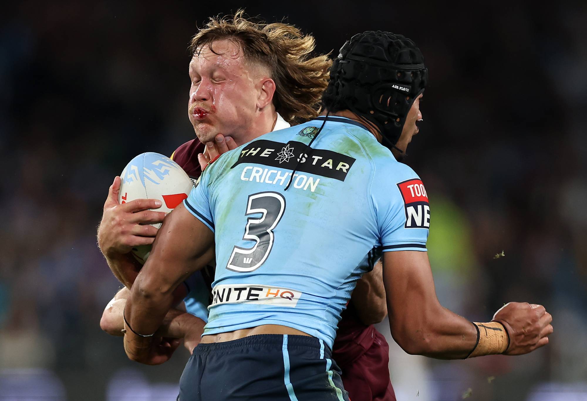 SYDNEY, AUSTRALIA - JULY 12: Reuben Cotter of the Maroons is tackled during game three of the State of Origin series between New South Wales Blues and Queensland Maroons at Accor Stadium on July 12, 2023 in Sydney, Australia. (Photo by Mark Kolbe/Getty Images)