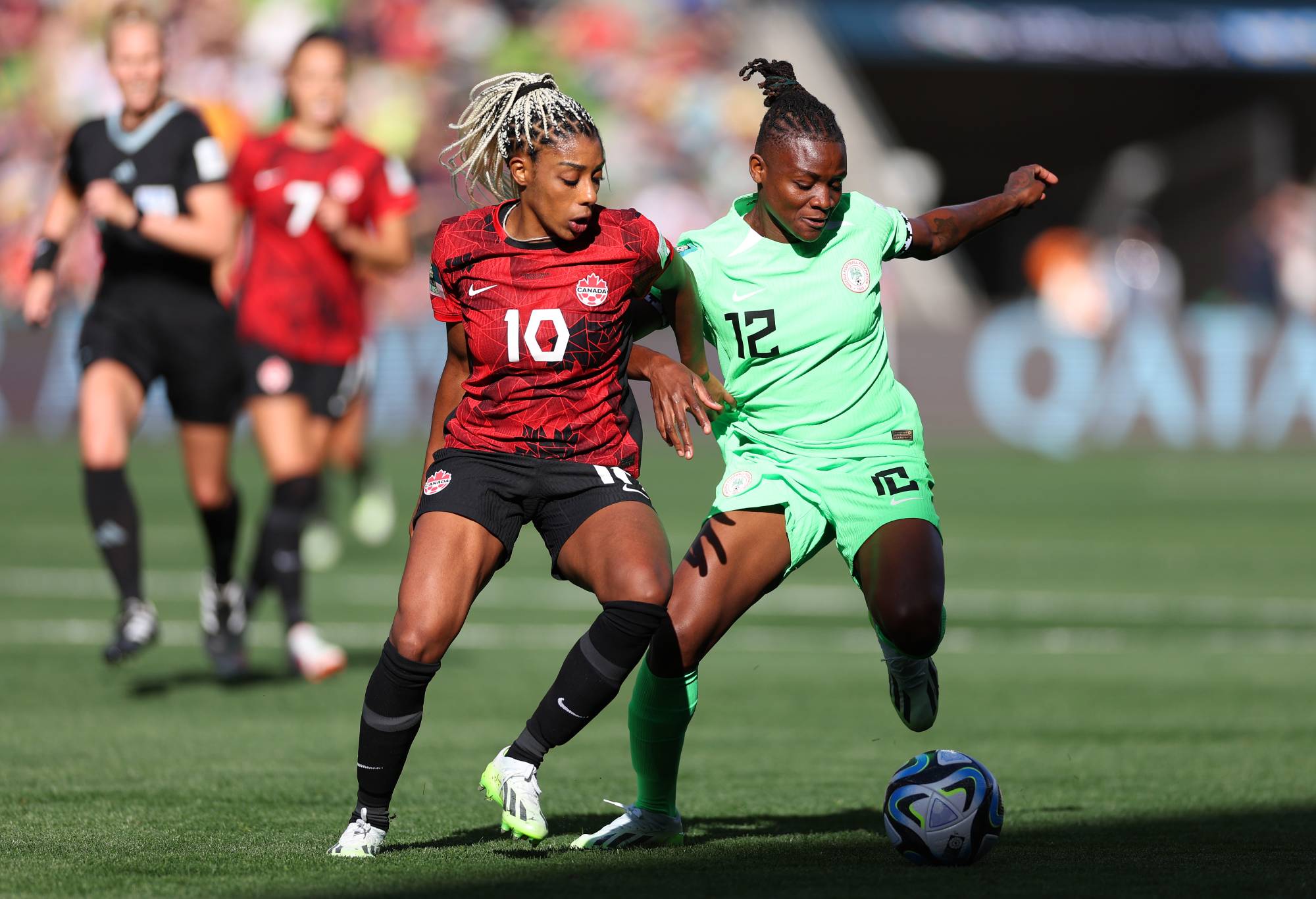 Uchenna Kanu of Nigeria and Ashley Lawrence of Canada compete for the ball during the FIFA Women's World Cup Australia & New Zealand 2023 Group B match between Nigeria and Canada at Melbourne Rectangular Stadium on July 21, 2023 in Melbourne, Australia. (Photo by Elsa - FIFA/FIFA via Getty Images)