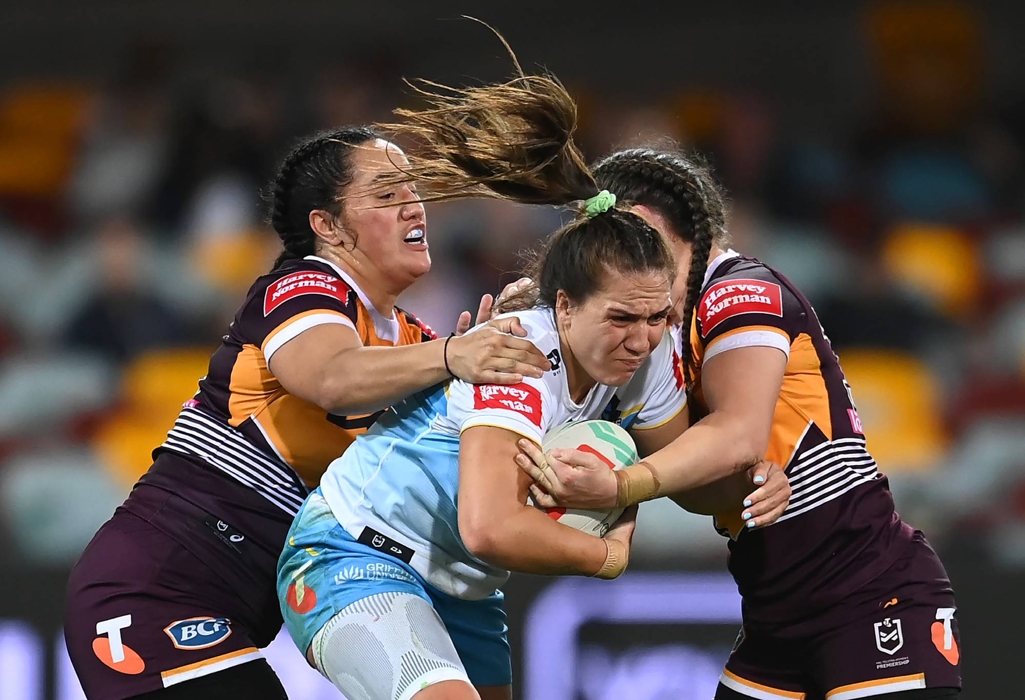 BRISBANE, AUSTRALIA - JULY 27: Evania Pelite of the Titans is tackled during the round two NRLW match between Brisbane Broncos and Gold Coast Titans at The Gabba, on July 27, 2023, in Brisbane, Australia. (Photo by Albert Perez/Getty Images)