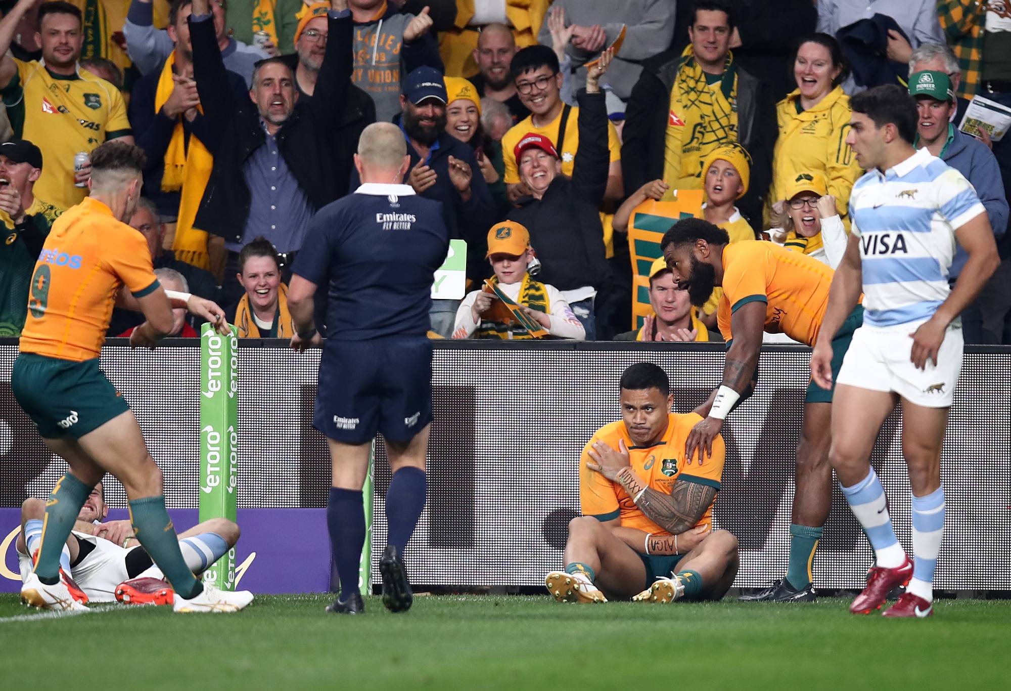Len Ikitau of the Wallabies holds his shoulder after scoring a try during The Rugby Championship match between the Australia Wallabies and Argentina at CommBank Stadium on July 15, 2023 in Sydney, Australia. (Photo by Jason McCawley/Getty Images)