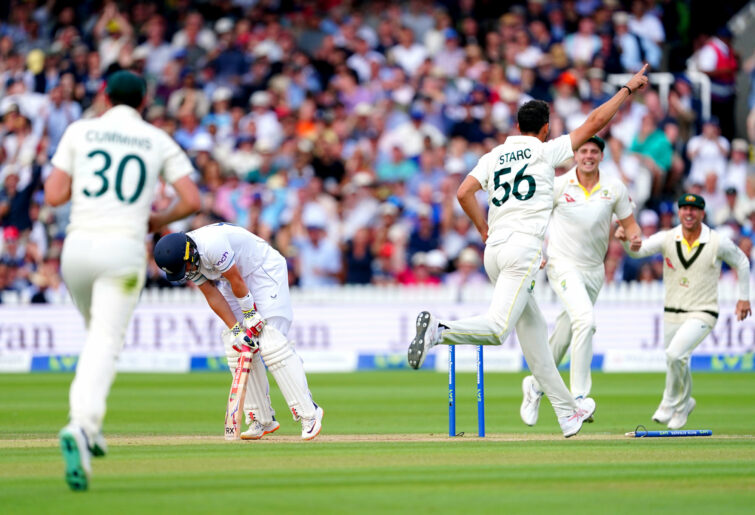 Mitchell Starc celebrates after bowling Ollie Pope.