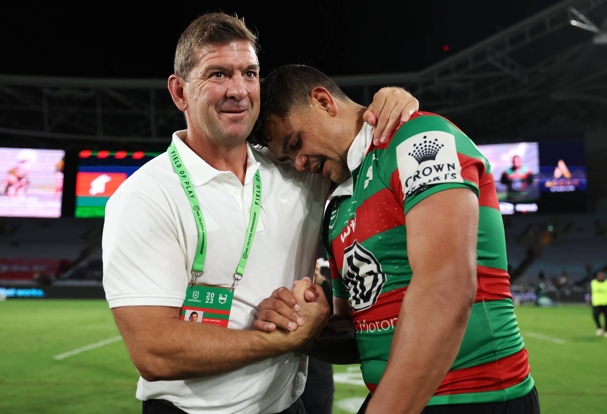 SYDNEY, AUSTRALIA - MARCH 25: Latrell Mitchell of the Rabbitohs celebrates with Rabbitohs head coach Jason Demetriou after victroy during the round four NRL match between South Sydney Rabbitohs and Manly Sea Eagles at Accor Stadium on March 25, 2023 in Sydney, Australia. (Photo by Mark Metcalfe/Getty Images)