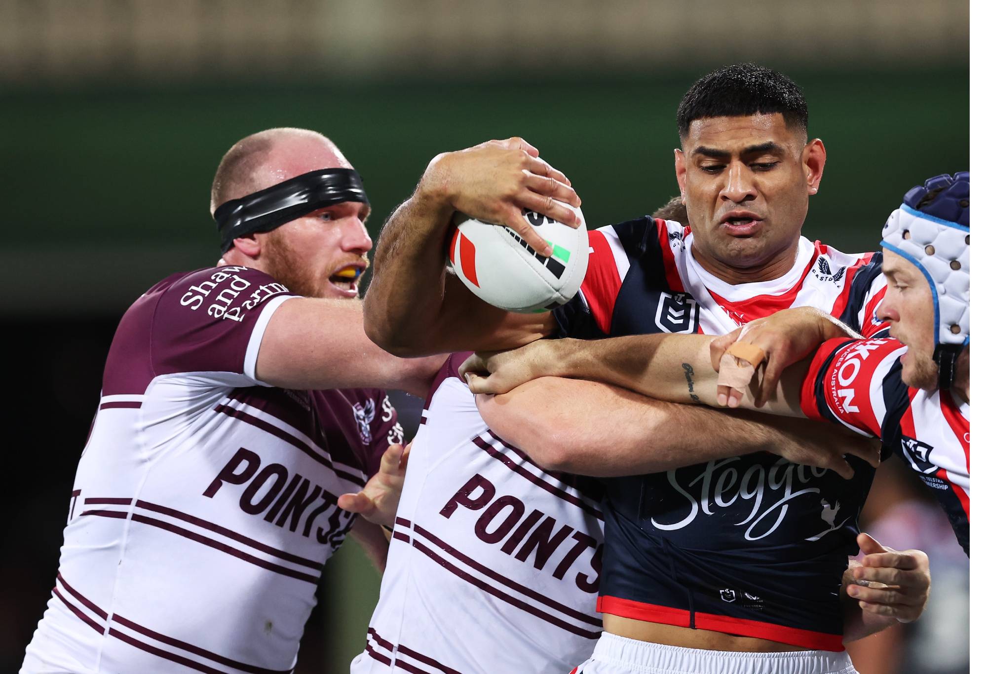 SYDNEY, AUSTRALIA - AUGUST 03: Daniel Tupou of the Roosters is tackled during the round 23 NRL match between the Sydney Roosters and Manly Sea Eagles at Sydney Cricket Ground on August 03, 2023 in Sydney, Australia. (Photo by Matt King/Getty Images)