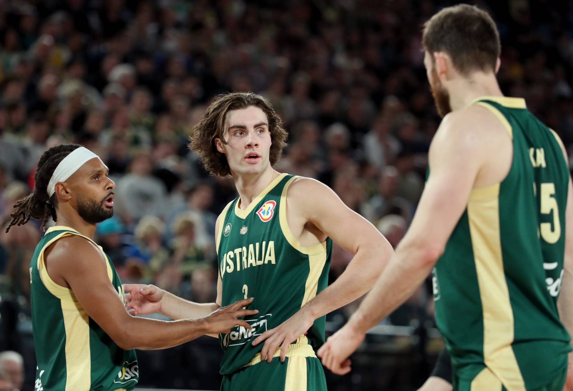 MELBOURNE, AUSTRALIA - AUGUST 16: Patty Mills and Josh Giddey of Australia react during the match between the Australia Boomers and Brazil at Rod Laver Arena on August 16, 2023 in Melbourne, Australia. (Photo by Kelly Defina/Getty Images)