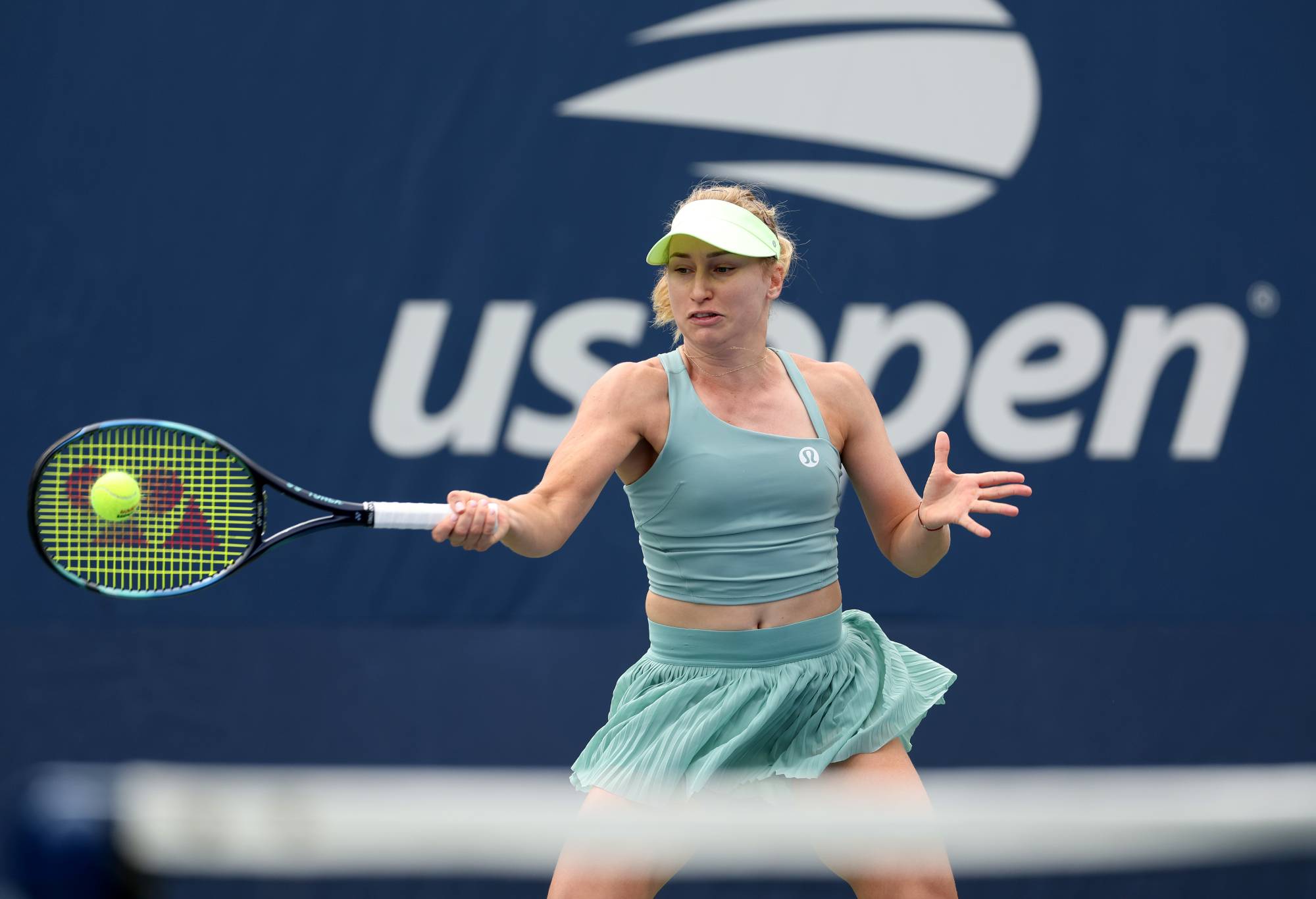 NEW YORK, NEW YORK - AUGUST 28: Daria Saville of Australia returns a shot against Clervie Ngounoue of the United States during their Women's Singles First Round match on Day One of the 2023 US Open at the USTA Billie Jean King National Tennis Center on August 28, 2023 in the Flushing neighborhood of the Queens borough of New York City. (Photo by Matthew Stockman/Getty Images)