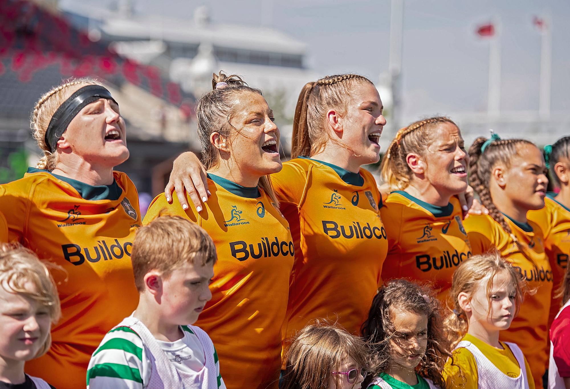 The Australia Wallaroos sing along to the national anthem prior to a game against U.S. in the World Rugby Pacific Four Series at TD Place Stadium on July 8, 2023 in Ottawa, Canada. (Photo by Andrea Cardin - World Rugby/World Rugby via Getty Images)