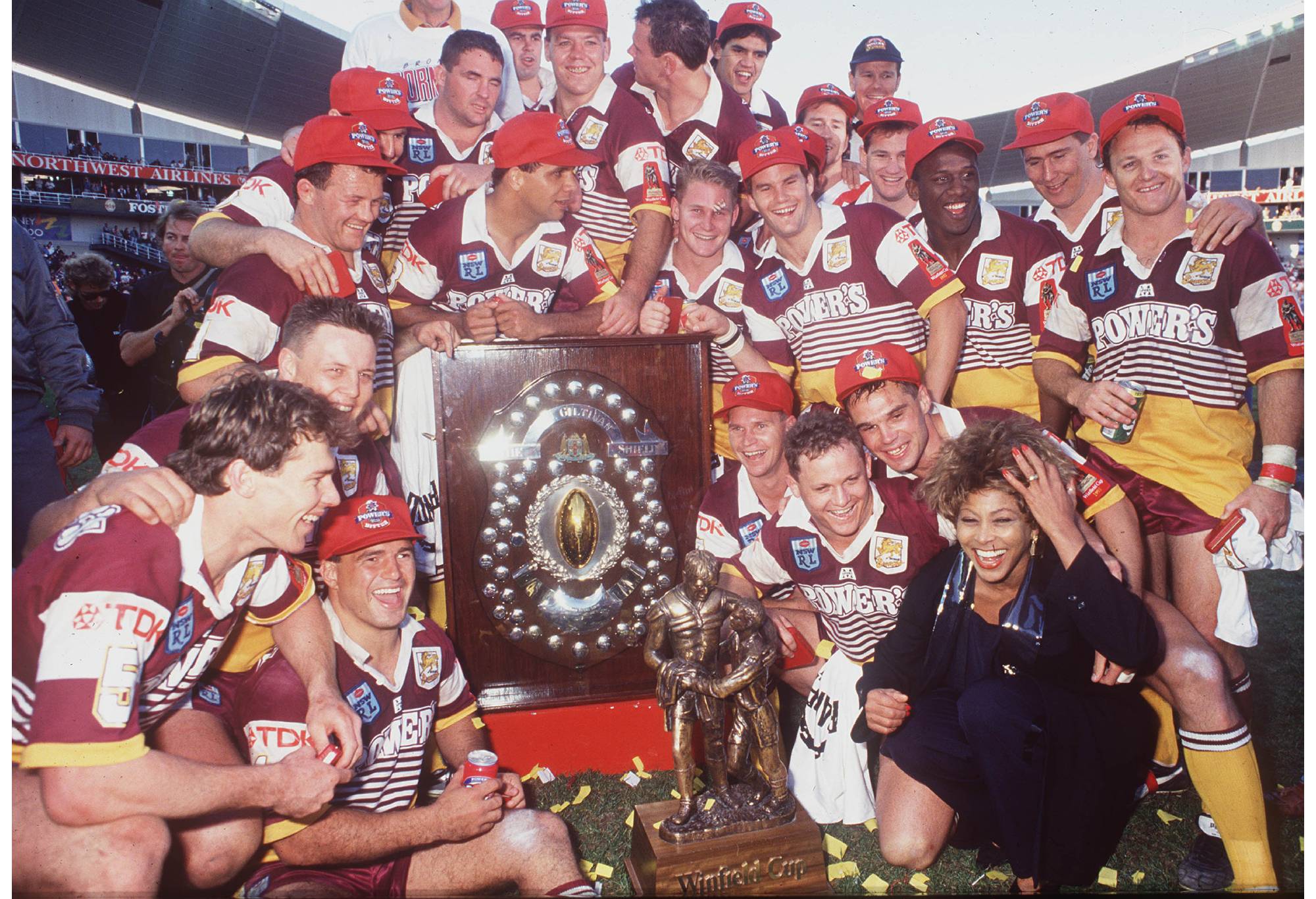 The 1993 Brisbane Broncos with Tina Turner. (Photo via Getty Images)