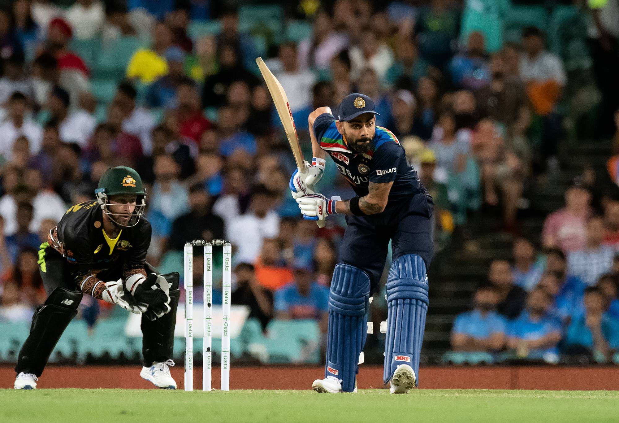 SYDNEY, AUSTRALIA - DECEMBER 07: Virat Kohli of India hits the ball during the Dettol T20 Series cricket match between Australia and India at the Sydney Cricket Ground on December 07, 2020 in Sydney, Australia. (Photo by Speed Media/Icon Sportswire via Getty Images)