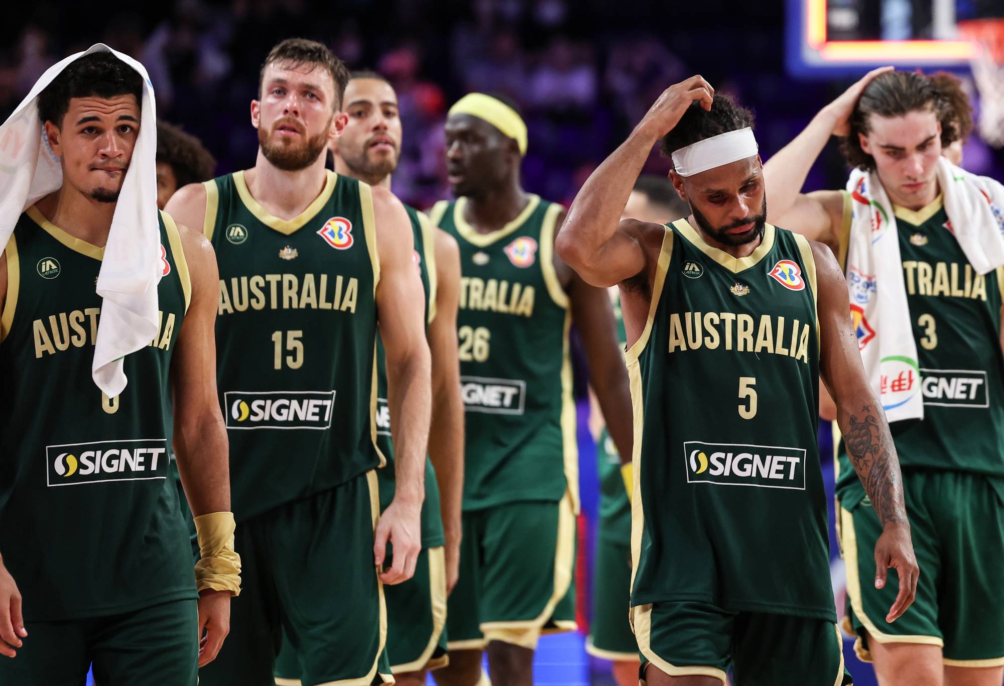 OKINAWA, JAPAN - SEPTEMBER 01: Australian players look dejected after the FIBA Basketball World Cup 2nd Round Group K game between Slovenia and Australia at Okinawa Arena on September 01, 2023 in Okinawa, Japan. (Photo by Takashi Aoyama/Getty Images)