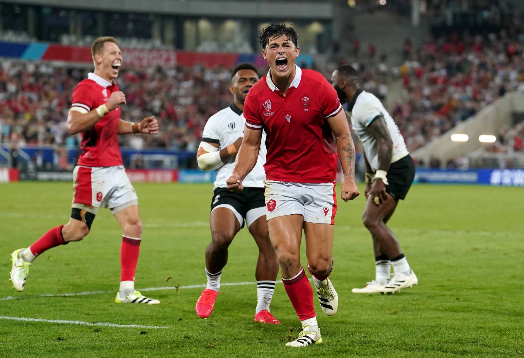 Wales' Louis Rees-Zammit celebrates at the final whistle during the 2023 Rugby World Cup Pool C match at the Stade de Bordeaux, France. Picture date: Sunday September 10, 2023. (Photo by David Davies/PA Images via Getty Images)